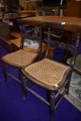 A pair of 19th Century cane seated bedroom chairs