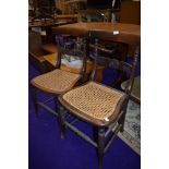 A pair of 19th Century cane seated bedroom chairs