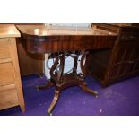 A 19th Century mahogany and inlaid fold over card table, complete but in need of some restoration