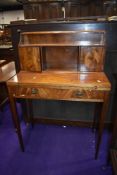 A reproduction Regency mahogany desk