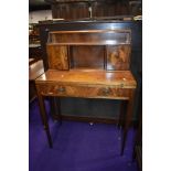 A reproduction Regency mahogany desk