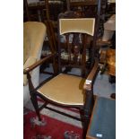 An art nouveau carvers dining chair having carved and inlayed detail