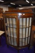 An early 20th Mahogany demi lune display cabinet