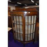 An early 20th Mahogany demi lune display cabinet