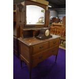 A late Victorian oak dressing table