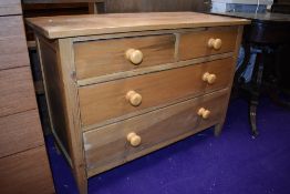 A stripped low chest of two over two drawers, width approx. 104cm