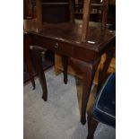 A hardwood side table having frieze drawer