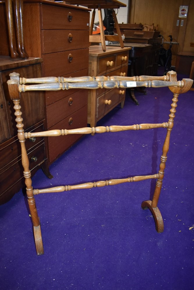 A Victorian stained frame towel rail