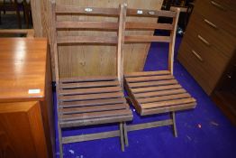 Two teak folding garden chairs