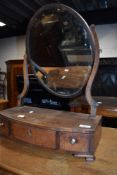 A 19th Century mahogany toilet mirror, having scroll frame and drawer base, width approx. 43cm