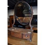 A 19th Century mahogany toilet mirror, having scroll frame and drawer base, width approx. 43cm