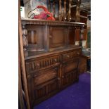 A Priory style court cupboard, width approx. 125cm