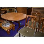 A vintage teak G Plan oval dining table and set of eight (six plus two) dining chairs