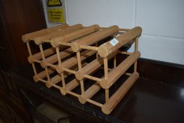 A pine kitchen wine rack