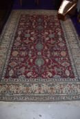 A traditional Persian rug, approx 213 x 135cm, fine weave