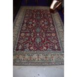 A traditional Persian rug, approx 213 x 135cm, fine weave
