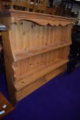 A natural pine plate rack, width approx. 113cm