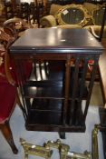 An Edwardian mahogany revolving bookcase