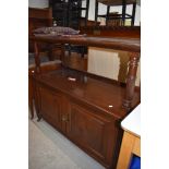 A late Victorian dresser buffet or side bar labelled by Maple having been presented by the Bersted