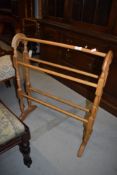 A beech framed towel rail or dryer