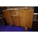 A mid 20th Century oak and ply sideboard, width approx. 122cm