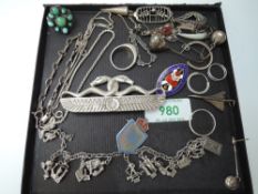 A selection of HM silver and white metal including a serpent brooch, box chain, bracelet, Concorde
