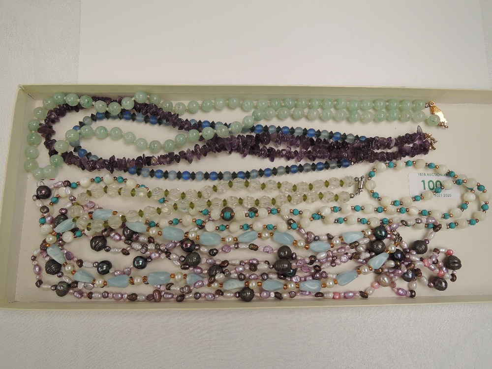 Seven strings of beads including polished amethyst style, crystal, jadeite style etc