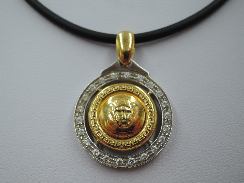 A white and yellow metal Versace Medusa style pendant necklace stamped 750 having the central Medusa - Image 2 of 3