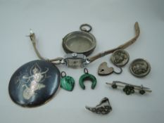 A small selection of white metal jewellery including Siam silver brooch/pendant, pocket watch case