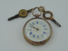 A small continental yellow metal key wound pocket watch stamped 9K having blue enamel and gilt Roman