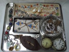 A tray of vintage costume jewellery including crystal beads, diamante, pocket watches, tie slides,