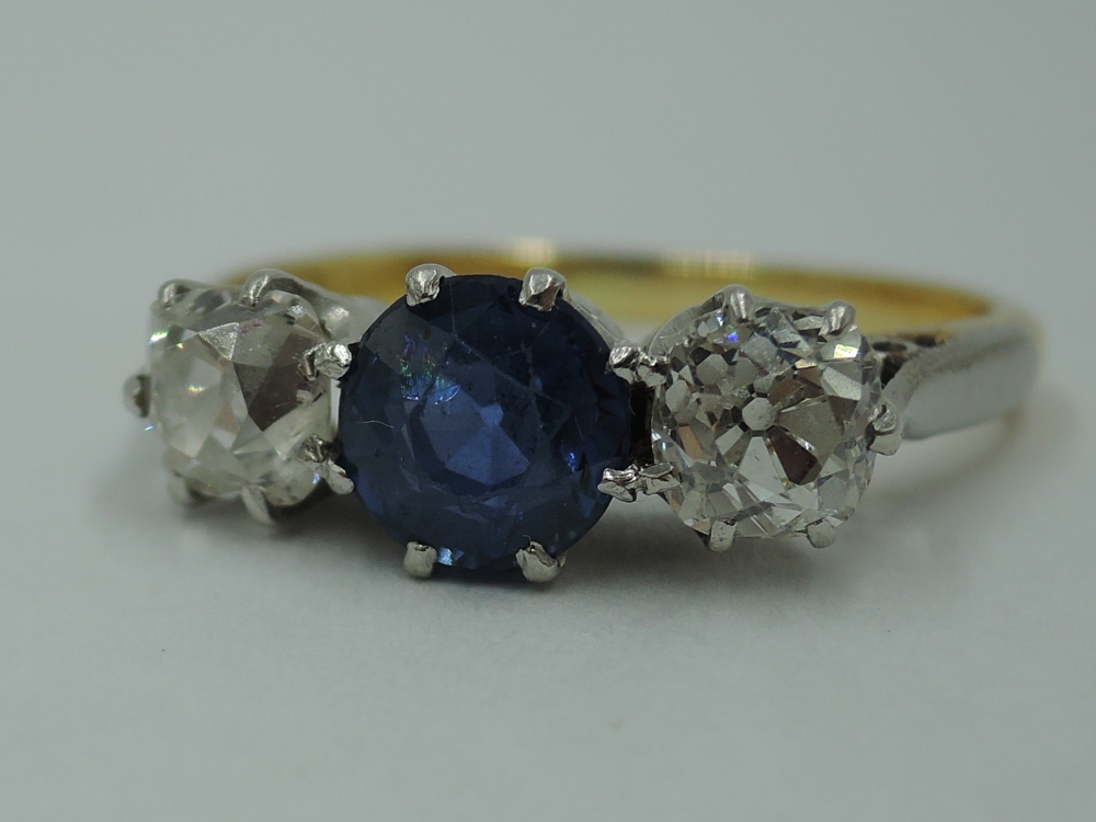 A lady's old cut sapphire and diamond three stone ring, sapphire approx .75ct and total diamonds - Image 3 of 3