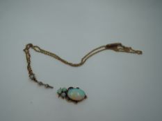 A damaged antique opal and diamond pendant and chain having a seed pearl connector with diamond