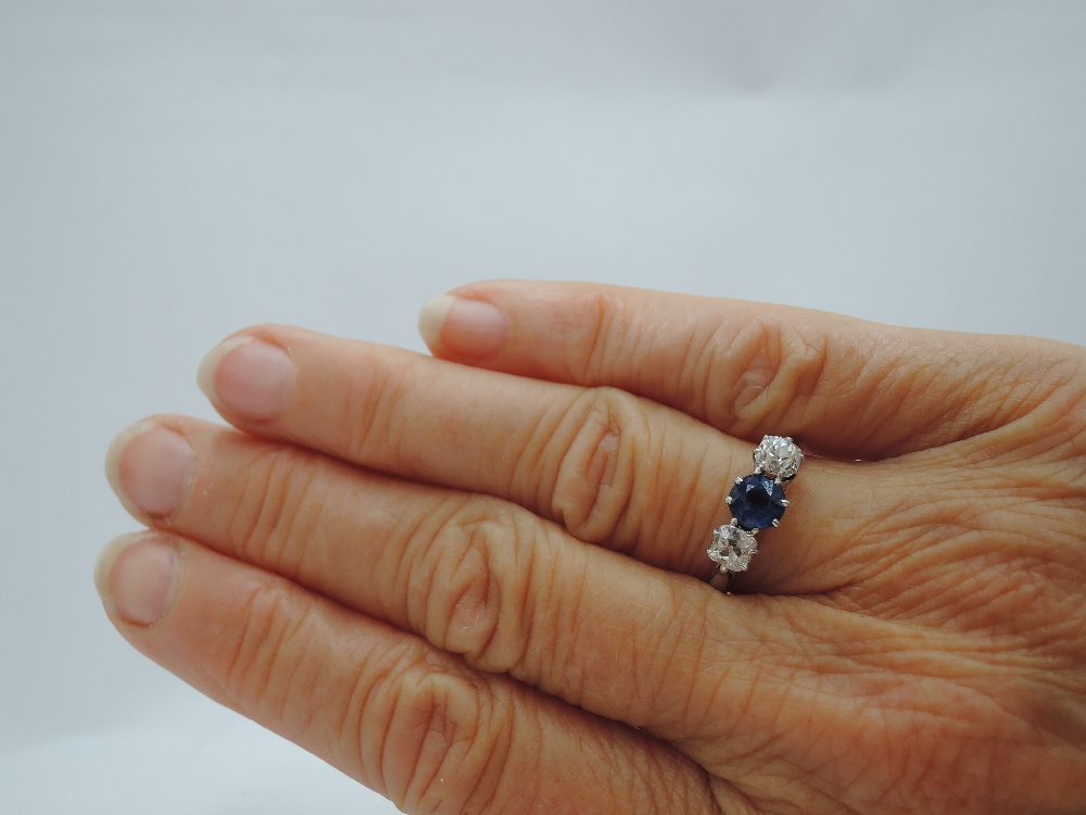 A lady's old cut sapphire and diamond three stone ring, sapphire approx .75ct and total diamonds - Image 2 of 3