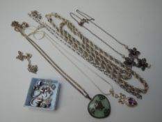 A small selection of silver jewellery including jadeite style pendant, rope chain, Celtic style
