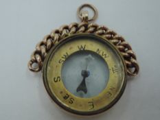 A 9ct rose gold compass pendant of traditional form, Chester 1920, GW approx 8g