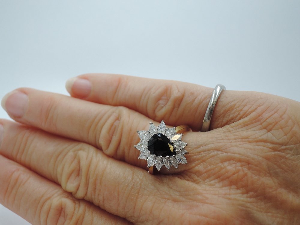 A sapphire and diamond teardrop cluster dress ring having graduated marquise cut diamonds, total - Image 2 of 3