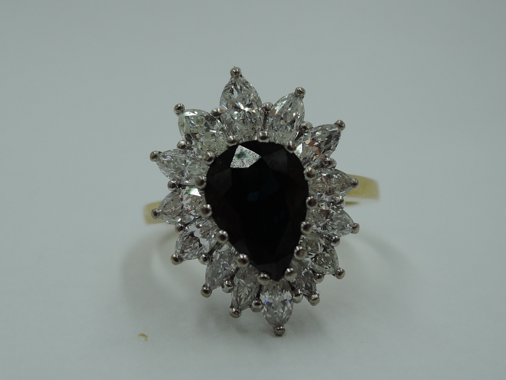 A sapphire and diamond teardrop cluster dress ring having graduated marquise cut diamonds, total - Image 3 of 3