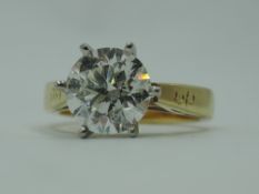 A diamond solitaire dress ring, approx 1.87ct brilliant cut, in a 6 claw tapered mount to engraved