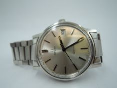 A gent's 1970's Omega Geneve automatic wrist watch having a baton numeral dial and date aperture