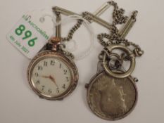 A continental silver miniature top wound pocket watch having an Arabic numeral dial to enamelled