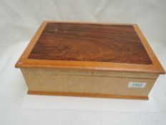 A treen jewellery box containing a selection of costume jewellery including seed, simulated pearl,