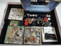 A large selection of mixed vintage clip and stud costume earrings of various forms