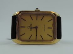 A gent's gold plated Omega De Ville mechanical wind wrist watch having a baton numeral dial to