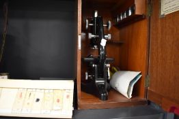 An early 20th century scientist microscope by Watsons in case and good selection of natural