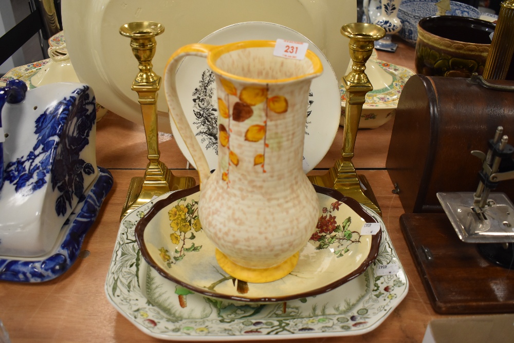Three ceramic bowls including Royal Doulton Australian 1887 Queen Victoria a Bewley water jug and
