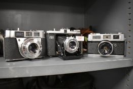Three cameras. A Rank Mamaya with a Mamiya Komina 40mm lens, a Zeiss Ikon Nettar with Novar-