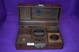 A mahogany cased opium smokers container or box with compartmental inner and bearing Chinese seal
