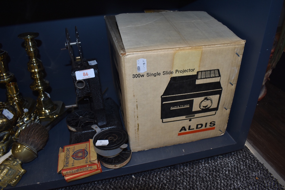A selection of projection equipment including Pathescope 9.5 mm film and Aldis Slide projector