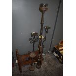 Five cast metal outside or other candle sticks including torchere style and also Bohemian table